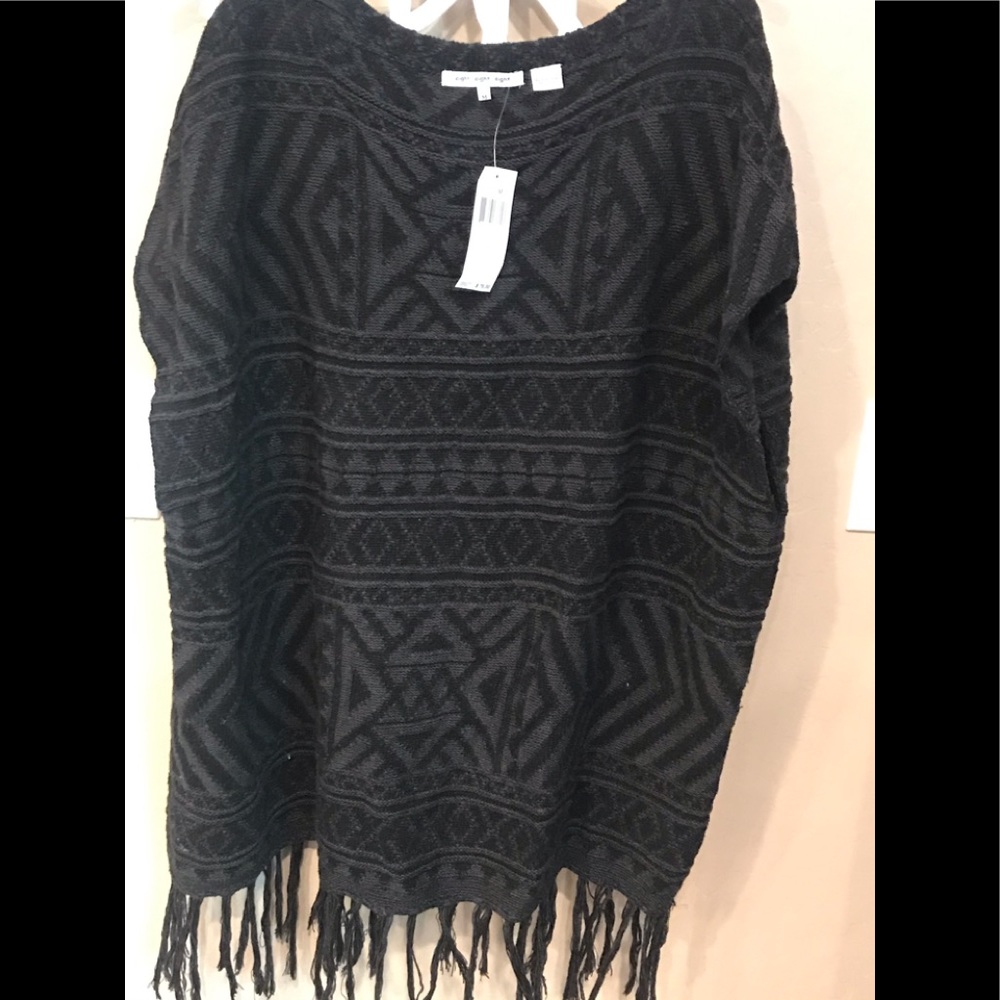 Woman’s black patterned poncho sz M new with tags
